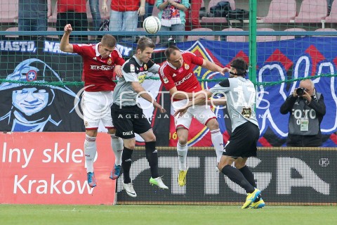  11.05.2013 KRAKOW PILKA NOZNA POLSKA T-MOBILE EKSTRAKLASA SEZON 2012/2013 <br />FOOTBALL POLISH EKSTRAKLASA SEASON 2012/2013 WISLA KRAKOW - KORONA KIELCE <br />N/Z PIOTR MALARCZYK ARKADIUSZ GLOWACKI PAVOL STANO <br /> 