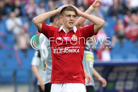  11.05.2013 KRAKOW PILKA NOZNA POLSKA T-MOBILE EKSTRAKLASA SEZON 2012/2013 <br />FOOTBALL POLISH EKSTRAKLASA SEASON 2012/2013 WISLA KRAKOW - KORONA KIELCE <br />N/Z MICHAL CHRAPEK SMUTEK ZLOSC <br /> 