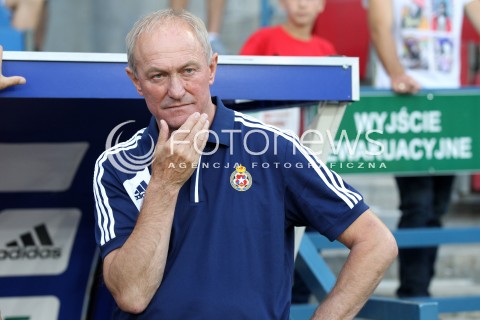  19.07.2013 KRAKOW <br />PILKA NOZNA POLSKA T-MOBILE EKSTRAKLASA SEZON 2013/2014 FOOTBALL POLISH EKSTRAKLASA SEASON 2013/2014 WISLA KRAKOW - GORNIK ZABRZE<br />N/Z FRANCISZEK SMUDA TRENER ( HEAD COACH ) SYLWETKA NAPIS WYJSCIE EWAKUACYJNE<br /> 