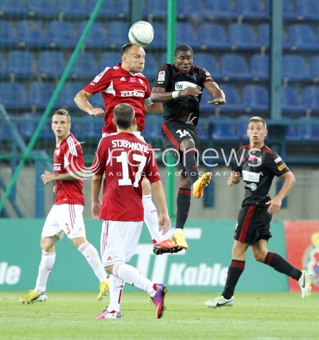 19.07.2013 KRAKOW <br />PILKA NOZNA POLSKA T-MOBILE EKSTRAKLASA SEZON 2013/2014 FOOTBALL POLISH EKSTRAKLASA SEASON 2013/2014 WISLA KRAKOW - GORNIK ZABRZE<br />N/Z PREJUCE NAKOULMA ARKADIUSZ GLOWACKI GLOWKA<br /> 