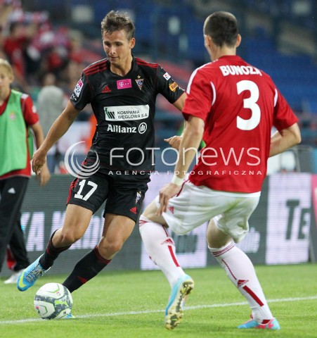  19.07.2013 KRAKOW <br />PILKA NOZNA POLSKA T-MOBILE EKSTRAKLASA SEZON 2013/2014 FOOTBALL POLISH EKSTRAKLASA SEASON 2013/2014 WISLA KRAKOW - GORNIK ZABRZE<br />N/Z PAWEL OLKOWSKI GORDAN BUNOZA<br /> 