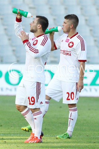  29.07.2013 KRAKOW <br />PILKA NOZNA POLSKA T-MOBILE EKSTRAKLASA SEZON 2013/2014 FOOTBALL POLISH EKSTRAKLASA SEASON 2013/2014 KORONA KIELCE - WISLA KRAKOW<br />N/Z MICHAL CHRAPEK PATRYK MALECKI BIDON PICIE WODA<br /> 