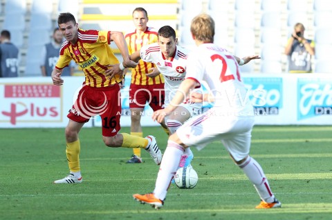  29.07.2013 KRAKOW <br />PILKA NOZNA POLSKA T-MOBILE EKSTRAKLASA SEZON 2013/2014 FOOTBALL POLISH EKSTRAKLASA SEASON 2013/2014 KORONA KIELCE - WISLA KRAKOW<br />N/Z GORDAN BUNOZA ARTUR LENARTOWSKI<br /> 