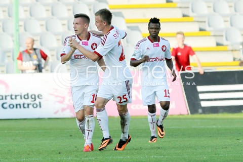  29.07.2013 KRAKOW <br />PILKA NOZNA POLSKA T-MOBILE EKSTRAKLASA SEZON 2013/2014 FOOTBALL POLISH EKSTRAKLASA SEASON 2013/2014 KORONA KIELCE - WISLA KRAKOW<br />N/Z LUKASZ GARGULA PAWEL STOLARSKI EMMANUEL SARKI RADOSC BRAMKA GOL EMOCJE<br /> 