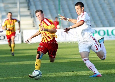  29.07.2013 KRAKOW <br />PILKA NOZNA POLSKA T-MOBILE EKSTRAKLASA SEZON 2013/2014 FOOTBALL POLISH EKSTRAKLASA SEASON 2013/2014 KORONA KIELCE - WISLA KRAKOW<br />N/Z MICHAL JANOTA GORDAN BUNOZA <br /> 