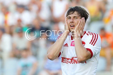  29.07.2013 KRAKOW <br />PILKA NOZNA POLSKA T-MOBILE EKSTRAKLASA SEZON 2013/2014 FOOTBALL POLISH EKSTRAKLASA SEASON 2013/2014 KORONA KIELCE - WISLA KRAKOW<br />N/Z RAFAL BOGUSKI EMOCJE SMUTEK<br /> 