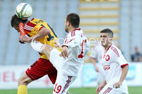  29.07.2013 KRAKOW <br />PILKA NOZNA POLSKA T-MOBILE EKSTRAKLASA SEZON 2013/2014 FOOTBALL POLISH EKSTRAKLASA SEASON 2013/2014 KORONA KIELCE - WISLA KRAKOW<br />N/Z PATRYK MALECKI ARTUR LENARTOWSKI FAUL<br /> 