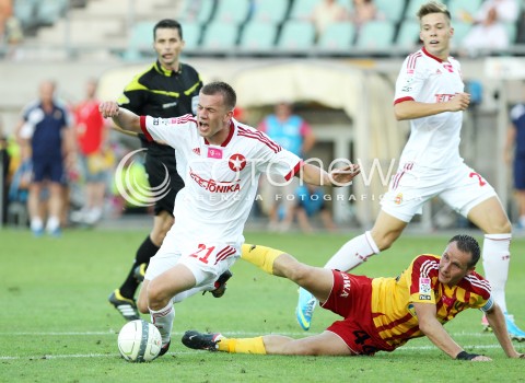 29.07.2013 KRAKOW <br />PILKA NOZNA POLSKA T-MOBILE EKSTRAKLASA SEZON 2013/2014 FOOTBALL POLISH EKSTRAKLASA SEASON 2013/2014 KORONA KIELCE - WISLA KRAKOW<br />N/Z LUKASZ BURLIGA PAWEL GOLANSKI KARNY FAUL <br /> 