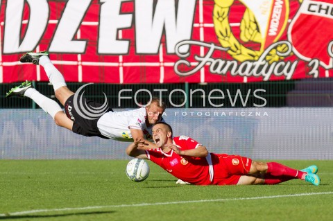  03.08.2013 LODZ PILKA NOZNA T-MOBILE EKSTRAKLASA SEZON 2013/2014 FOOTBALL POLISH EKSTRAKLASA SEASON WIDZEW LODZ - KORONA KIELCE N/Z MARCIN KACZMAREK ZBIGNIEW MALKOWSKI FAUL CZERWONA KARTKA  