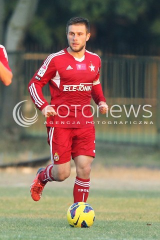  11.08.2013 MIELEC PILKA NOZNA<br />MECZ KONTROLNY MECZ TOWARZYSKI<br />STAL MIELEC - WISLA KRAKOW<br />N/Z PATRYK MALECKI SYLWETKA<br /> 