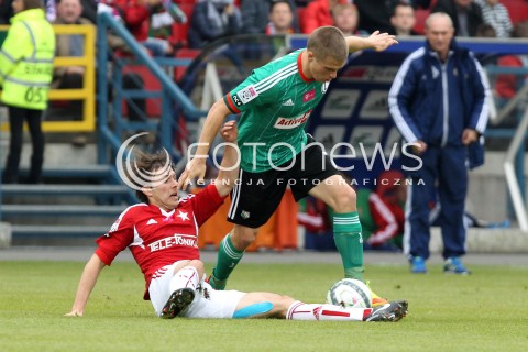  06.10.2013 KRAKOW <br />PILKA NOZNA POLSKA T-MOBILE EKSTRAKLASA SEZON 2013/2014 FOOTBALL POLISH EKSTRAKLASA SEASON 2013/2014 WISLA KRAKOW - LEGIA WARSZAWA<br />N/Z RAFAL BOGUSKI HENRIK OJAMAA <br /> 