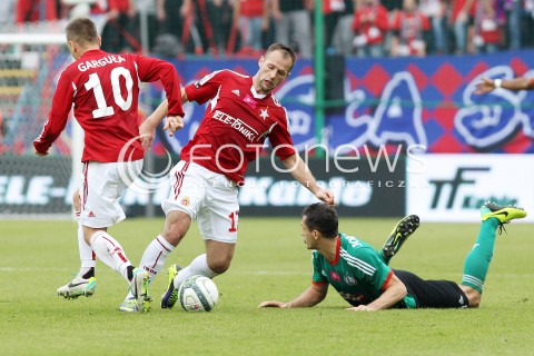  06.10.2013 KRAKOW <br />PILKA NOZNA POLSKA T-MOBILE EKSTRAKLASA SEZON 2013/2014 FOOTBALL POLISH EKSTRAKLASA SEASON 2013/2014 WISLA KRAKOW - LEGIA WARSZAWA<br />N/Z TOMASZ JODLOWIEC OSTOJA STJEPANOVIC LUKASZ GARGULA <br /> 