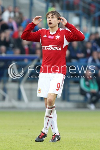  06.10.2013 KRAKOW <br />PILKA NOZNA POLSKA T-MOBILE EKSTRAKLASA SEZON 2013/2014 FOOTBALL POLISH EKSTRAKLASA SEASON 2013/2014 WISLA KRAKOW - LEGIA WARSZAWA<br />N/Z RAFAL BOGUSKI SMUTEK PORAZKA NIEDOWIERZANIE EMOCJE<br /> 