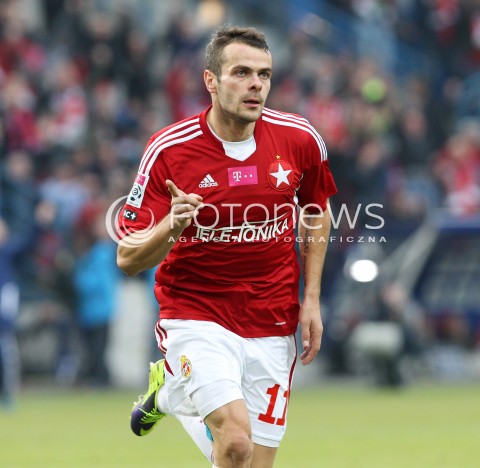  06.10.2013 KRAKOW <br />PILKA NOZNA POLSKA T-MOBILE EKSTRAKLASA SEZON 2013/2014 FOOTBALL POLISH EKSTRAKLASA SEASON 2013/2014 WISLA KRAKOW - LEGIA WARSZAWA<br />N/Z PAWEL BROZEK RADOSC EMOCJE BRAMKA GOL STRZAL NA 1:0<br /> 