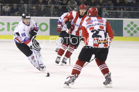  29.12.2013 SANOK <br />HOKEJ NA LODZIE<br />FINAL PUCHARU POLSKI<br />MECZ CIARKO PBS BANK SANOK - COMARCH CRACOVIA <br />N/Z ANTHONY AQUINO ADRIAN KOWALOWKA SEBASTIAN KOWALOWKA <br /> 