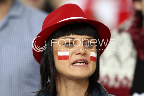  05.01.2014 LODZ ATLAS ARENA<br />SIATKOWKA KOBIET<br />KWALIFIKACJE DO MISTRZOSTW SWIATA 2014<br />2014 FIVB WORLD CHAMPIONSHIP - EUROPEAN QUALIFICATION WOMEN <br />MECZ POLSKA - BELGIA ( POLAND - BELGIUM )<br />N/Z KOBIETA KIBIC DOPING OPRAWA POMALOWANA TWARZ PASIAK FLAGA<br /> 