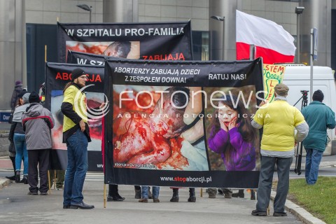  08.03.2014 RZESZOW <br />PIKIETA PRZECIW ZABIJANIU CHORYCH NIENARODZONYCH DZIECI W RZESZOWSKIM SZPITALU PRO-FAMILIA. <br />NA BANERACH WYKORZYSTANO DRASTYCZNE ZDJECIA MARTWYCH DZIECI ORAZ WIZERUNKI LEKARZY PRACUJACYCH W SZPITALU.<br /> 