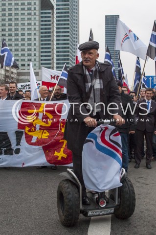  23.03.2014 WARSZAWA MARSZ NOWEJ PRAWICY PO WIELKIM KONGRESIE PRAWICY W WARSZAWIE N/Z PREZES KNP JANUSZ KORWIN MIKKE NA POJEZDZIE DWUKOLOWYM SEGWAY  