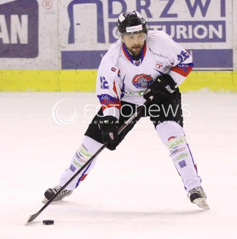  28.03.2014 SANOK HOKEJ NA LODZIE<br />PLH SEZON 2013 / 2014 - MECZ O 1. MIEJSCE FINAL<br />MECZ CIARKO PBS BANK SANOK - GKS TYCHY<br />N/Z MACIEJ MERMER SYLWETKA <br /> 