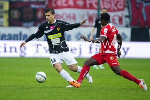  16.05.2014 LODZ <br />
PILKA NOZNA POLSKA POLISH T-MOBILE EKSTRAKLASA GRUPA SPADKOWA SEZON SEASON 2013/2014 FOOTBALL WIDZEW LODZ - JAGIELLONIA BIALYSTOK<br />
N/Z ADAM DZWIGALA PRINCEWILL OKACHI<br />
 