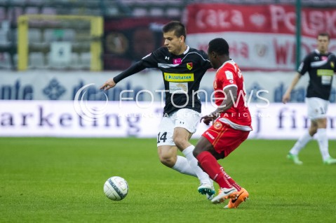  16.05.2014 LODZ <br />
PILKA NOZNA POLSKA POLISH T-MOBILE EKSTRAKLASA GRUPA SPADKOWA SEZON SEASON 2013/2014 FOOTBALL WIDZEW LODZ - JAGIELLONIA BIALYSTOK<br />
N/Z ADAM DZWIGALA PRINCEWILL OKACHI<br />
 