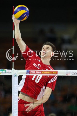  17.05.2014 WROCLAW <br />SIATKOWKA MEZCZYZN <br />TURNIEJ KWALIFIKACYJNY DO MISTRZOSTW EUROPY 2015<br />2015 FIVB WORLD CHAMPIONSHIP - EUROPEAN QUALIFICATION MEN <br />MECZ POLSKA - MACEDONIA ( POLAND - FYROM ) <br />N/Z MARIUSZ WLAZLY SYLWETKA ATAK<br /> 