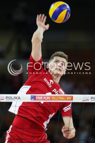  17.05.2014 WROCLAW <br />SIATKOWKA MEZCZYZN <br />TURNIEJ KWALIFIKACYJNY DO MISTRZOSTW EUROPY 2015<br />2015 FIVB WORLD CHAMPIONSHIP - EUROPEAN QUALIFICATION MEN <br />MECZ POLSKA - MACEDONIA ( POLAND - FYROM ) <br />N/Z PIOTR NOWAKOWSKI SYLWETKA ATAK<br /> 