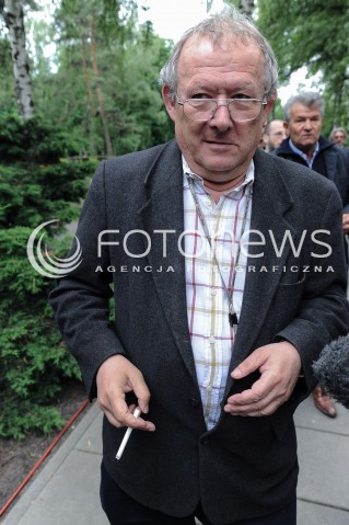  30.05.2014 WARSZAWA <br />POGRZEB GENERALA WOJCIECHA JARUZELSKIEGO NA WARSZAWSKIM WOJSKOWYM CMENTARZU NA POWAZKACH<br />N/Z ADAM MICHNIK  <br /> 