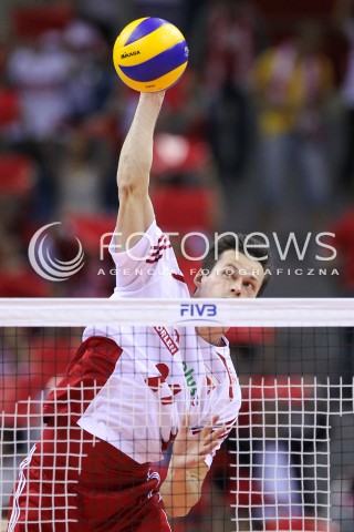  20.06.2014 KRAKOW ARENA<br />SIATKOWKA MEZCZYZN <br />LIGA SWIATOWA 2014<br />FIVB VOLLEYBALL WORLD LEAGUE 2014<br />MECZ POLSKA - BRAZYLIA ( POLAND - BRASIL ) <br />N/Z RAFAL BUSZEK SYLWETKA ATAK<br /> 