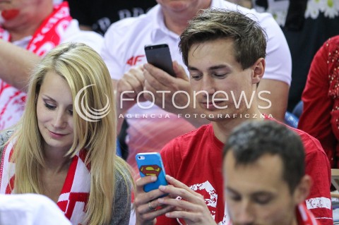  20.06.2014 KRAKOW ARENA<br />
SIATKOWKA MEZCZYZN <br />
LIGA SWIATOWA 2014<br />
FIVB VOLLEYBALL WORLD LEAGUE 2014<br />
MECZ POLSKA - BRAZYLIA ( POLAND - BRASIL ) <br />
N/Z KAMIL STOCH Z ZONA EWA BILAN STOCH PODCZAS MECZU NA TRYBUNACH SIEDZIAL MIEDZY INNYMI KIBICAMI<br />
 