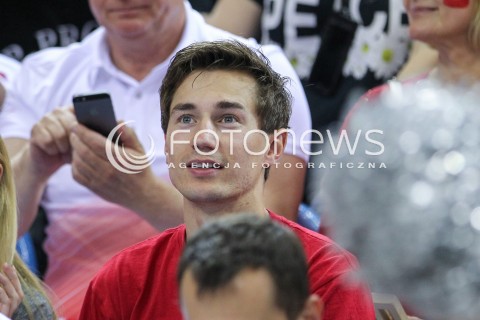  20.06.2014 KRAKOW ARENA<br />
SIATKOWKA MEZCZYZN <br />
LIGA SWIATOWA 2014<br />
FIVB VOLLEYBALL WORLD LEAGUE 2014<br />
MECZ POLSKA - BRAZYLIA ( POLAND - BRASIL ) <br />
N/Z KAMIL STOCH Z ZONA EWA BILAN STOCH PODCZAS MECZU NA TRYBUNACH SIEDZIAL MIEDZY INNYMI KIBICAMI<br />
 