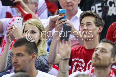  20.06.2014 KRAKOW ARENA<br />
SIATKOWKA MEZCZYZN <br />
LIGA SWIATOWA 2014<br />
FIVB VOLLEYBALL WORLD LEAGUE 2014<br />
MECZ POLSKA - BRAZYLIA ( POLAND - BRASIL ) <br />
N/Z KAMIL STOCH Z ZONA EWA BILAN STOCH PODCZAS MECZU NA TRYBUNACH SIEDZIAL MIEDZY INNYMI KIBICAMI<br />
 