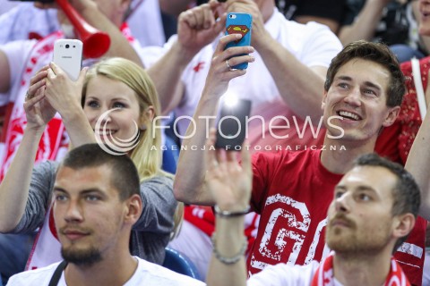  20.06.2014 KRAKOW ARENA<br />
SIATKOWKA MEZCZYZN <br />
LIGA SWIATOWA 2014<br />
FIVB VOLLEYBALL WORLD LEAGUE 2014<br />
MECZ POLSKA - BRAZYLIA ( POLAND - BRASIL ) <br />
N/Z KAMIL STOCH Z ZONA EWA BILAN STOCH PODCZAS MECZU NA TRYBUNACH SIEDZIAL MIEDZY INNYMI KIBICAMI<br />
 