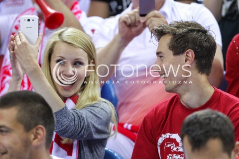  20.06.2014 KRAKOW ARENA<br />
SIATKOWKA MEZCZYZN <br />
LIGA SWIATOWA 2014<br />
FIVB VOLLEYBALL WORLD LEAGUE 2014<br />
MECZ POLSKA - BRAZYLIA ( POLAND - BRASIL ) <br />
N/Z KAMIL STOCH Z ZONA EWA BILAN STOCH PODCZAS MECZU NA TRYBUNACH SIEDZIAL MIEDZY INNYMI KIBICAMI<br />
 
