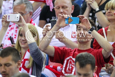  20.06.2014 KRAKOW ARENA<br />
SIATKOWKA MEZCZYZN <br />
LIGA SWIATOWA 2014<br />
FIVB VOLLEYBALL WORLD LEAGUE 2014<br />
MECZ POLSKA - BRAZYLIA ( POLAND - BRASIL ) <br />
N/Z KAMIL STOCH Z ZONA EWA BILAN STOCH PODCZAS MECZU NA TRYBUNACH SIEDZIAL MIEDZY INNYMI KIBICAMI<br />
 