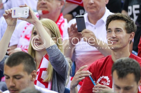 20.06.2014 KRAKOW ARENA<br />
SIATKOWKA MEZCZYZN <br />
LIGA SWIATOWA 2014<br />
FIVB VOLLEYBALL WORLD LEAGUE 2014<br />
MECZ POLSKA - BRAZYLIA ( POLAND - BRASIL ) <br />
N/Z KAMIL STOCH Z ZONA EWA BILAN STOCH PODCZAS MECZU NA TRYBUNACH SIEDZIAL MIEDZY INNYMI KIBICAMI<br />
 