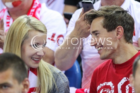  20.06.2014 KRAKOW ARENA<br />
SIATKOWKA MEZCZYZN <br />
LIGA SWIATOWA 2014<br />
FIVB VOLLEYBALL WORLD LEAGUE 2014<br />
MECZ POLSKA - BRAZYLIA ( POLAND - BRASIL ) <br />
N/Z KAMIL STOCH Z ZONA EWA BILAN STOCH PODCZAS MECZU NA TRYBUNACH SIEDZIAL MIEDZY INNYMI KIBICAMI<br />
 