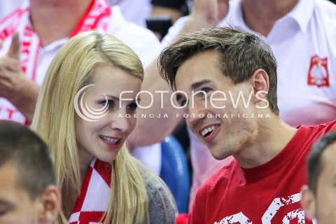  20.06.2014 KRAKOW ARENA<br />
SIATKOWKA MEZCZYZN <br />
LIGA SWIATOWA 2014<br />
FIVB VOLLEYBALL WORLD LEAGUE 2014<br />
MECZ POLSKA - BRAZYLIA ( POLAND - BRASIL ) <br />
N/Z KAMIL STOCH Z ZONA EWA BILAN STOCH PODCZAS MECZU NA TRYBUNACH SIEDZIAL MIEDZY INNYMI KIBICAMI<br />
 
