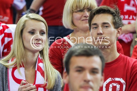  20.06.2014 KRAKOW ARENA<br />
SIATKOWKA MEZCZYZN <br />
LIGA SWIATOWA 2014<br />
FIVB VOLLEYBALL WORLD LEAGUE 2014<br />
MECZ POLSKA - BRAZYLIA ( POLAND - BRASIL ) <br />
N/Z KAMIL STOCH Z ZONA EWA BILAN STOCH PODCZAS MECZU NA TRYBUNACH SIEDZIAL MIEDZY INNYMI KIBICAMI<br />
 