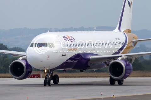  29.07.2014 LOTNISKO JASIONKA<br />ZDJECIE ILUSTRACYJNE<br />N/Z SAMOLOT AIRBUS A320 - 212 LINII LOTNICZYCH 4YOU AIRLINES - REJESTRACJA UR-CME<br /> 