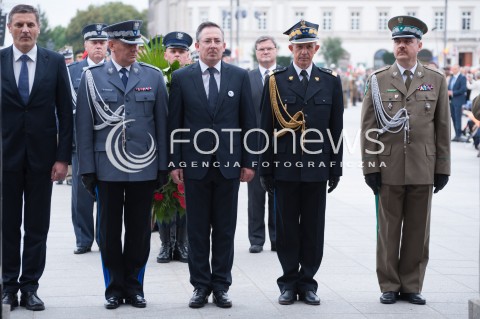  01.08.2014 WARSZAWA<br />70 ROCZNICA POWSTANIA WARSZAWSKIEGO<br />UROCZYSTA ZMIANA WARTY PRZY GROBIE NIEZNANEGO ZOLNIERZA<br />N/Z MINISTER SPRAW WEWNETRZNYCH BARTLOMIEJ SIENKIEWICZ  <br /> 