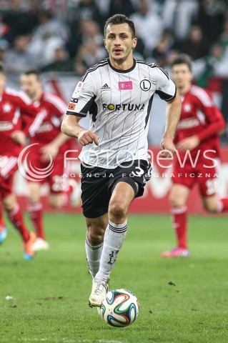  15.03.2015 WARSZAWA PILKA NOZNA<br />SEZON 2014/2015 FOOTBALL POLISH T-MOBILE EKSTRAKLASA<br />MECZ LEGIA WARSZAWA - WISLA KRAKOW NA STADIONIE MARSZALKA JOZEFA PILSUDSKIEGO<br />N/Z TOMASZ JODLOWIEC<br /> 