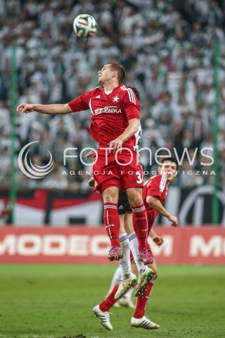  15.03.2015 WARSZAWA PILKA NOZNA<br />SEZON 2014/2015 FOOTBALL POLISH T-MOBILE EKSTRAKLASA<br />MECZ LEGIA WARSZAWA - WISLA KRAKOW NA STADIONIE MARSZALKA JOZEFA PILSUDSKIEGO<br />N/Z MICHAL CZEKAJ<br /> 