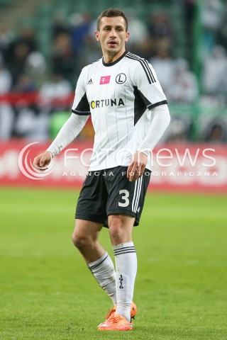  04.04.2015 WARSZAWA PILKA NOZNA<br />SEZON 2014/2015 FOOTBALL POLISH T-MOBILE EKSTRAKLASA<br />MECZ LEGIA WARSZAWA - PIAST GLIWICE NA STADIONIE MARSZALKA JOZEFA PILSUDSKIEGO<br />N/Z TOMASZ JODLOWIEC<br /> 