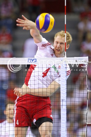  03.07.2015 KRAKOW <br />
SIATKOWKA MEZCZYZN LIGA SWIATOWA 2015 <br />
FIVB VOLLEYBALL WORLD LEAGUE 2015 <br />
MECZ POLSKA - USA ( POLAND - UNITED STATES ) <br />
N/Z JAKUB JAROSZ SYLWETKA ATAK<br />
 