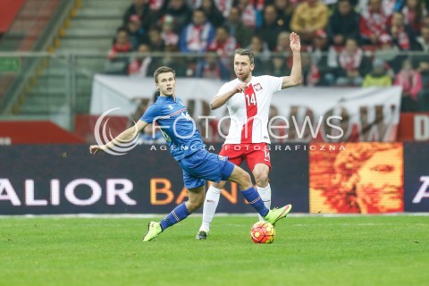  13.11.2015 WARSZAWA PILKA NOZNA <br />FRIENDLY FOOTBALL MATCH<br />POLISH NATIONAL TEAM<br />MECZ TOWARZYSKI<br />MECZ POLSKA - ISLANDIA<br />N/Z JAKUB WAWRZYNIAK ARNOR INGVI TRUSTASON<br /> 