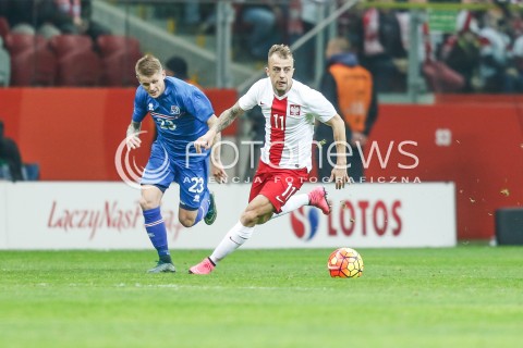  13.11.2015 WARSZAWA PILKA NOZNA <br />FRIENDLY FOOTBALL MATCH<br />POLISH NATIONAL TEAM<br />MECZ TOWARZYSKI<br />MECZ POLSKA - ISLANDIA<br />N/Z KAMIL GROSICKI ARI FREYR SKULASON<br /> 