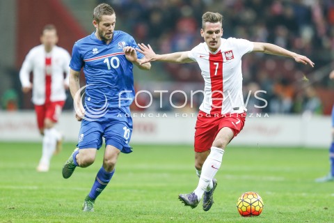 13.11.2015 WARSZAWA PILKA NOZNA <br />FRIENDLY FOOTBALL MATCH<br />POLISH NATIONAL TEAM<br />MECZ TOWARZYSKI<br />MECZ POLSKA - ISLANDIA<br />N/Z GYLFI THOR SIGURDSSON ARKADIUSZ MILIK<br /> 