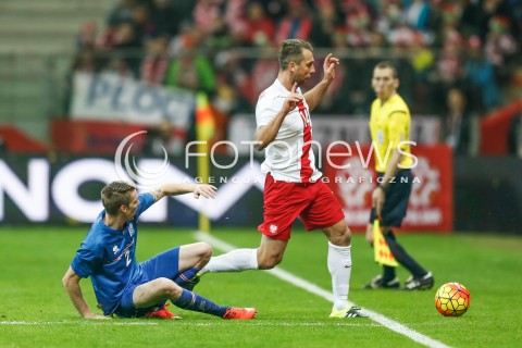  13.11.2015 WARSZAWA PILKA NOZNA <br />FRIENDLY FOOTBALL MATCH<br />POLISH NATIONAL TEAM<br />MECZ TOWARZYSKI<br />MECZ POLSKA - ISLANDIA<br />N/Z JAKUB WAWRZYNIAK BIRKIR MAR SAEVARSSON<br /> 
