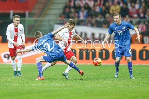  13.11.2015 WARSZAWA PILKA NOZNA <br />FRIENDLY FOOTBALL MATCH<br />POLISH NATIONAL TEAM<br />MECZ TOWARZYSKI<br />MECZ POLSKA - ISLANDIA<br />N/Z MACIEJ RYBUS BIRKIR MAR SAEVARSSON<br /> 